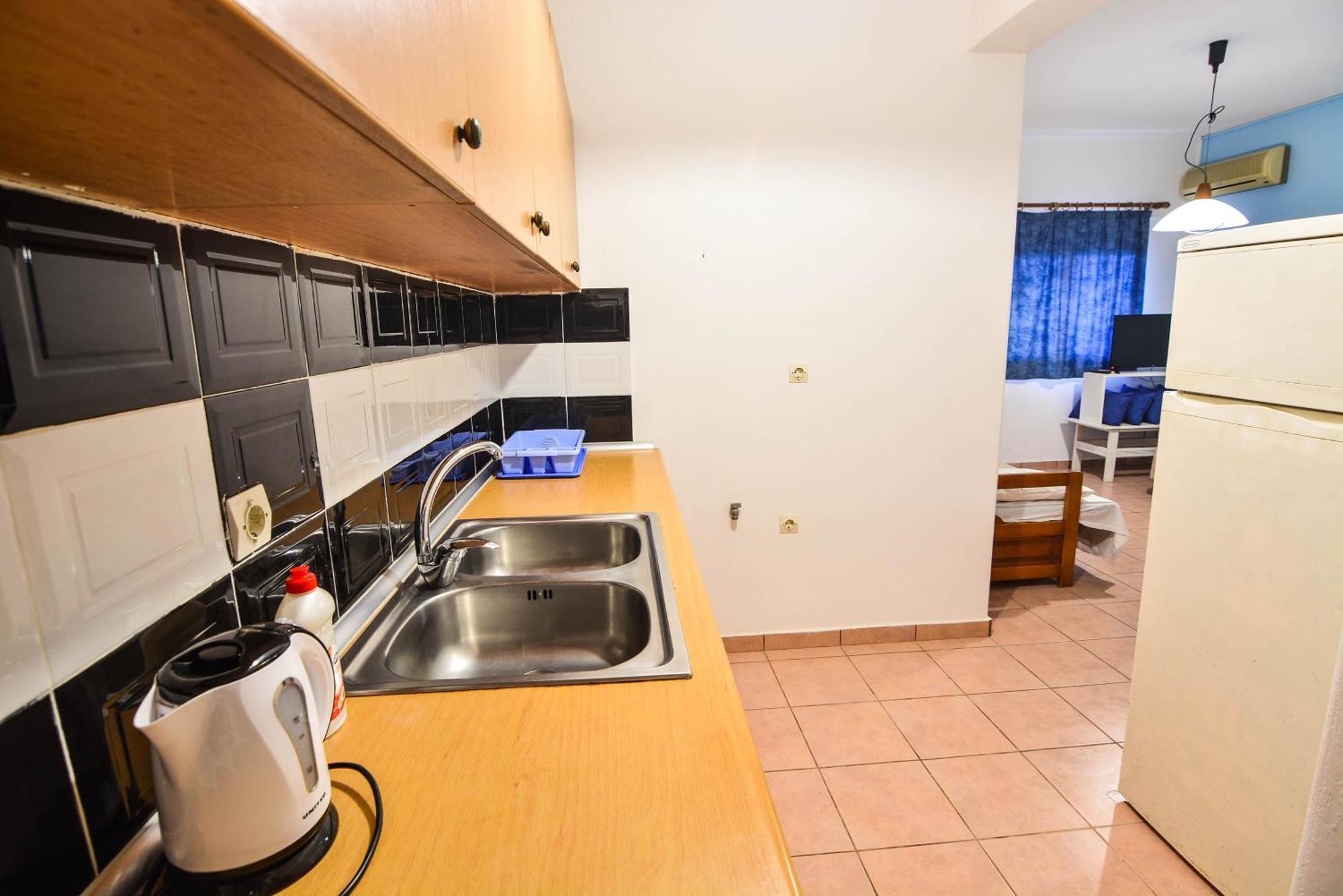 Epavlis Apartments Порто Хели Экстерьер фото